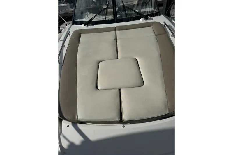 Lololand Yacht Photos Pics 2018 Jeanneau Leader 36 boat with cushioned sunbathing area on deck.