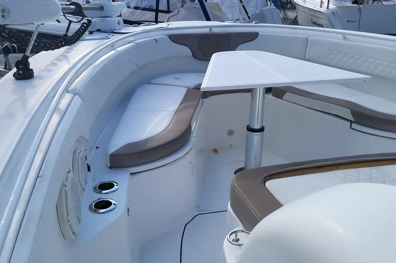  Yacht Photos Pics 2018 Edgewater 370CC boat interior with seating and table, featuring modern design.
