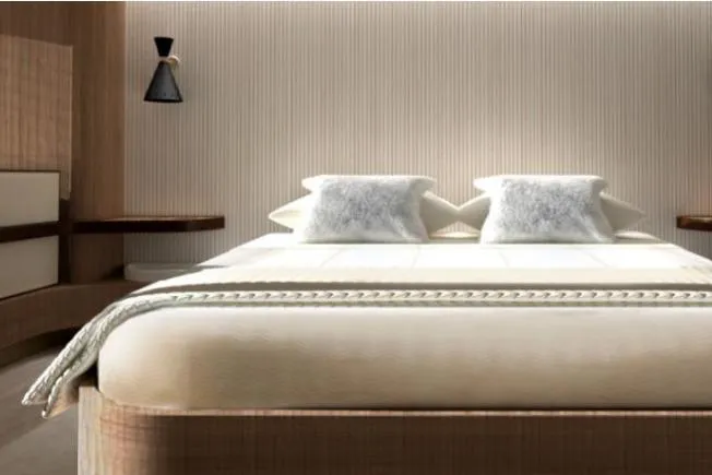 Azimut 66 Magellano Yacht Photos Pics Luxurious bedroom interior on a 2021 Azimut Magellano 66 yacht, featuring elegant bedding and modern decor.