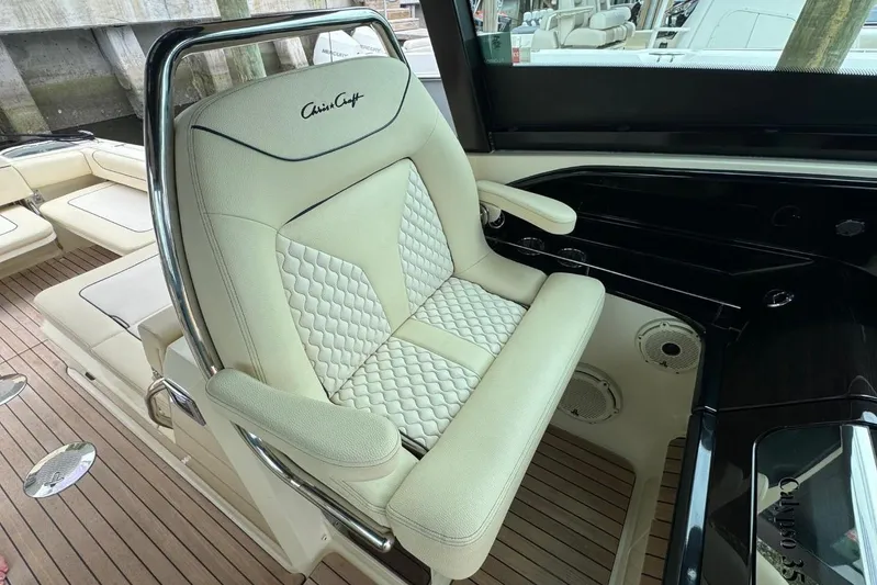  Yacht Photos Pics Luxurious seating on 2022 Chris-Craft Calypso 35 boat with elegant design and craftsmanship.