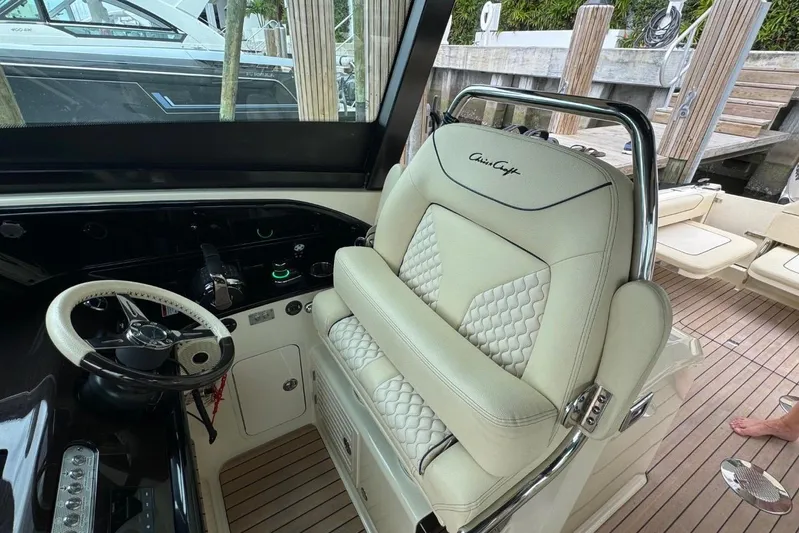  Yacht Photos Pics 2022 Chris-Craft Calypso 35 helm with luxurious seating and modern controls.