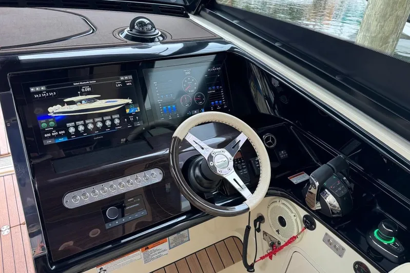  Yacht Photos Pics 2022 Chris-Craft Calypso 35 dashboard with advanced navigation and control systems.