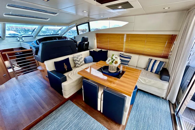 Casa Sul Mare Yacht Photos Pics Luxurious interior of 2010 Sunseeker Predator 64 yacht with elegant seating and decor.