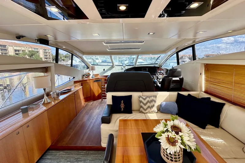 Casa Sul Mare Yacht Photos Pics Luxurious interior of a 2010 Sunseeker Predator 64 yacht with elegant furnishings and decor.