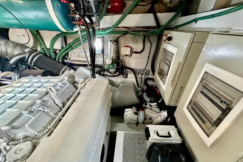 Casa Sul Mare Yacht Photos Pics Engine room of 2010 Sunseeker Predator 64 yacht with mechanical components and wiring.