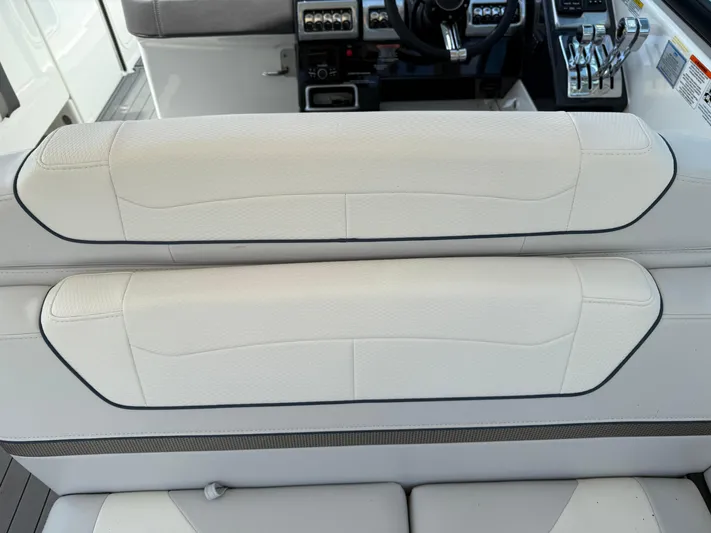  Yacht Photos Pics 2023 Formula 350 Crossover Bowrider I/O interior with white leather seating and control panel.