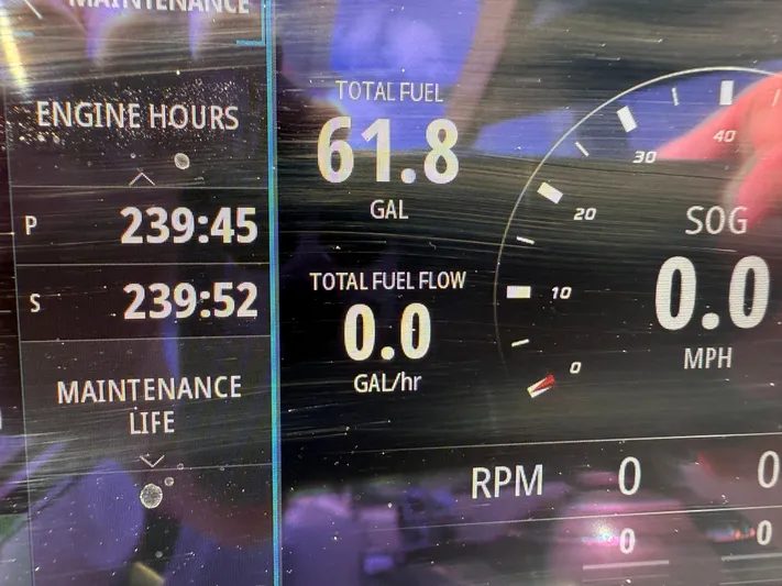  Yacht Photos Pics 2023 Formula 350 Crossover Bowrider dashboard showing engine hours and fuel data.