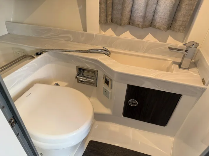  Yacht Photos Pics 2023 Formula 350 Crossover Bowrider I/O bathroom with modern fixtures and compact design.