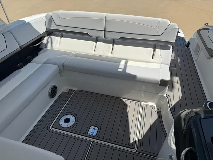  Yacht Photos Pics 2023 Formula 350 Crossover Bowrider I/O interior with cushioned seating and sleek flooring.