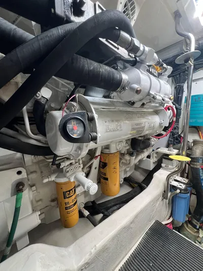 Audacious Yacht Photos Pics Engine room of 2008 Tiara Yachts 4200 Open, showcasing detailed mechanical components.