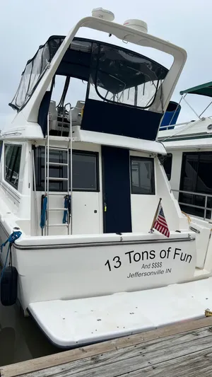  Yacht Photos Pics 1999 Bayliner 3988 Motoryacht docked, named "13 Tons of Fun," Jeffersonville, IN.
