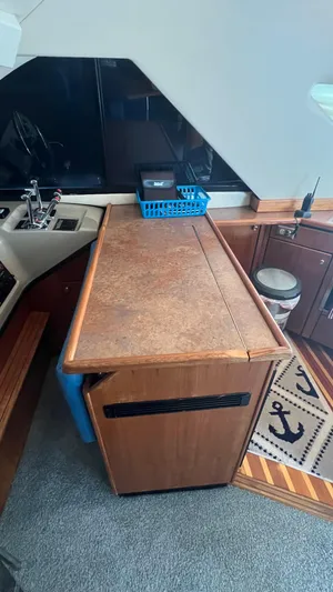  Yacht Photos Pics Interior of 1999 Bayliner 3988 Motoryacht with kitchenette and nautical decor.