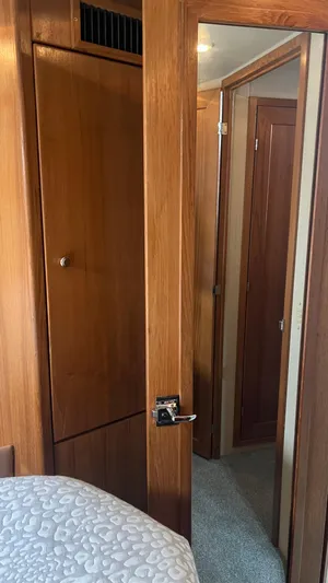  Yacht Photos Pics Interior of 1999 Bayliner 3988 Motoryacht with wooden doors and cozy cabin.