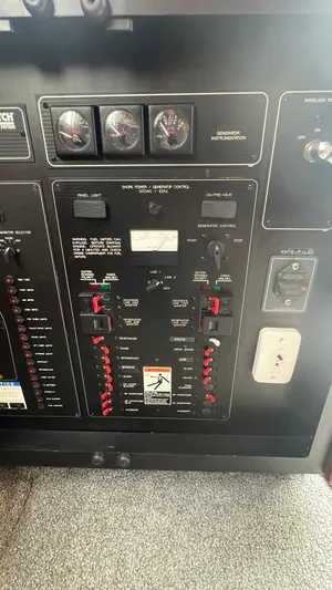  Yacht Photos Pics Control panel of a 1999 Bayliner 3988 Motoryacht with gauges and switches.