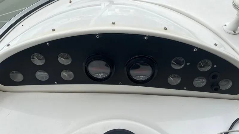  Yacht Photos Pics Instrument panel of a 1999 Bayliner 3988 Motoryacht with RPM gauges and dials.