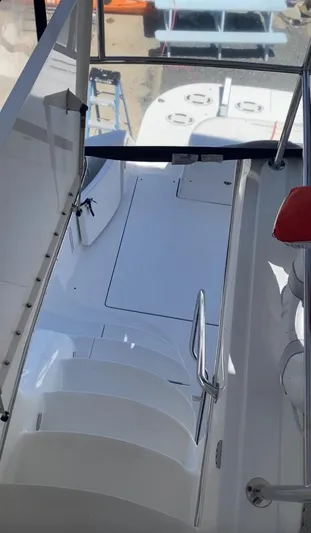  Yacht Photos Pics 2002 Sea Ray 56 Sedan Bridge yacht interior with stairs and seating area.