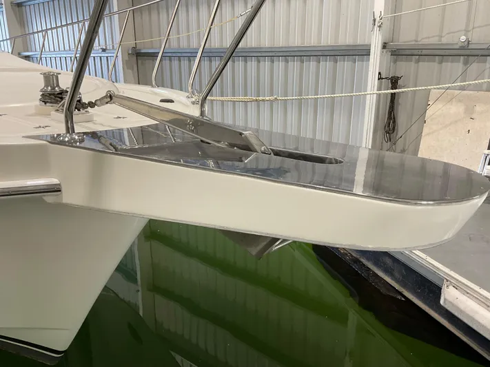  Yacht Photos Pics Bow of 2007 Ocean Alexander 54V yacht in a marina setting.