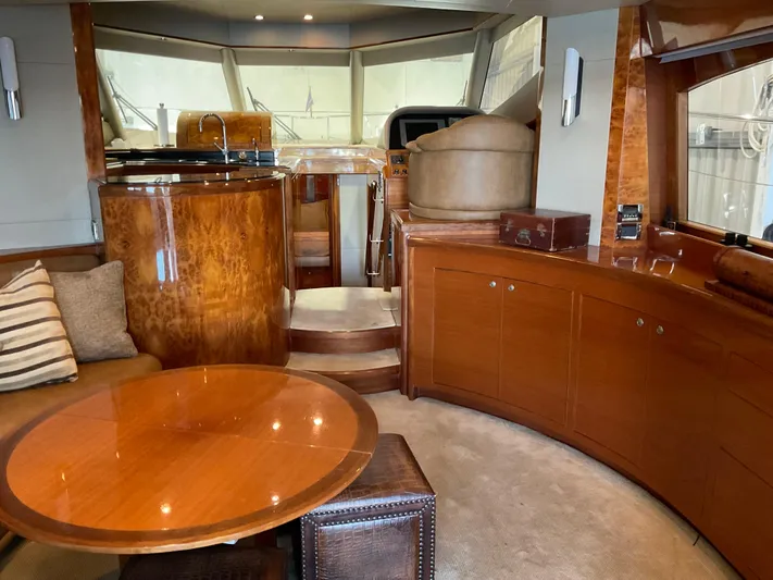  Yacht Photos Pics Luxurious interior of 2007 Ocean Alexander 54V yacht with elegant wood finishes and modern design.