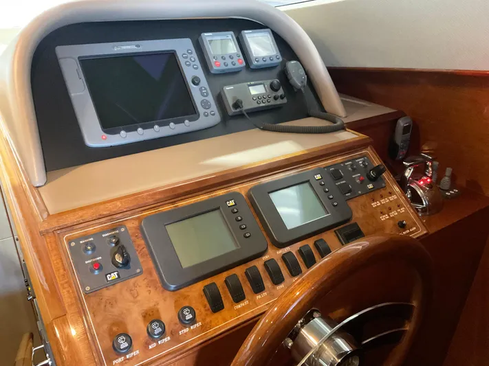  Yacht Photos Pics Control panel of a 2007 Ocean Alexander 54V yacht with navigation instruments.