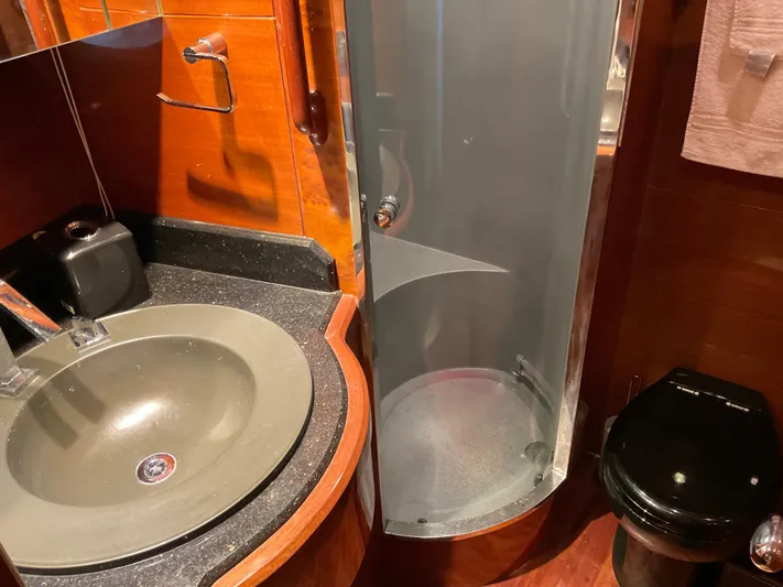  Yacht Photos Pics Luxurious bathroom in 2007 Ocean Alexander 54V yacht with modern sink and shower.