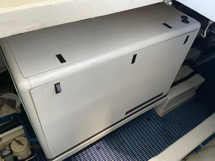  Yacht Photos Pics Engine compartment of a 2007 Ocean Alexander 54V yacht, featuring a generator.