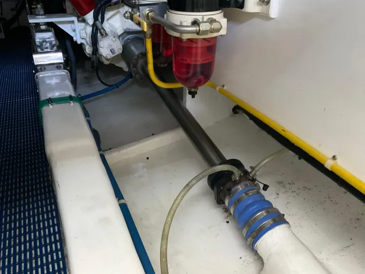  Yacht Photos Pics Engine compartment of a 2007 Ocean Alexander 54V yacht, showcasing mechanical components.