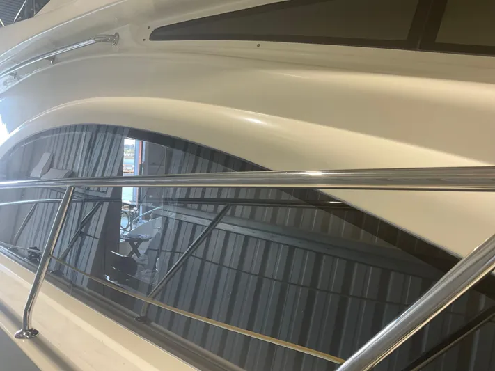  Yacht Photos Pics 2007 Ocean Alexander 54V yacht, sleek design with polished railings and modern windows.