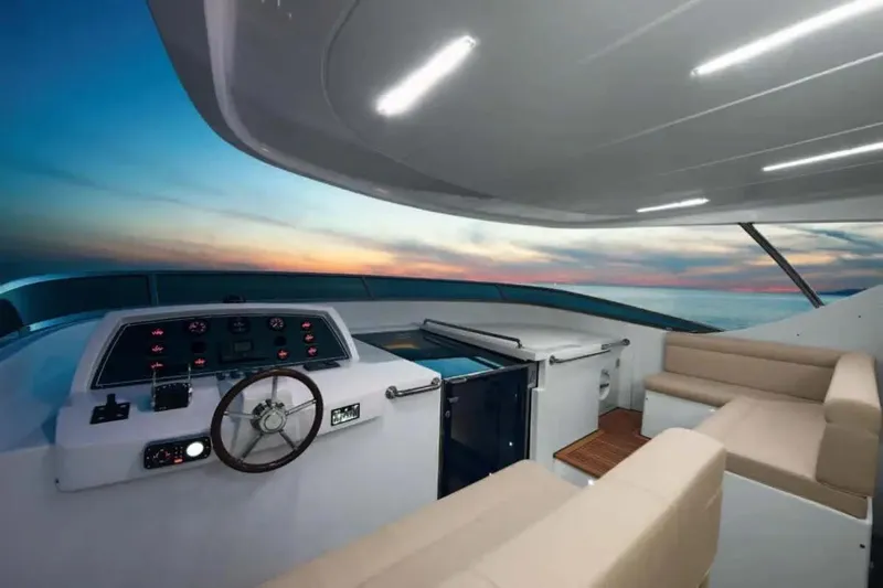  Yacht Photos Pics Luxurious 2011 Benetti Delfino 93 yacht interior with sunset view, featuring modern helm and seating.