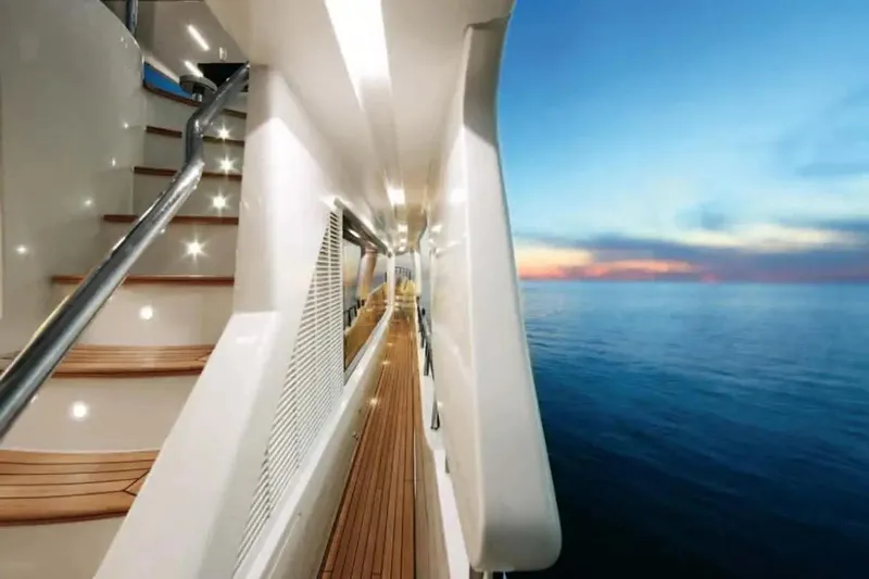  Yacht Photos Pics Luxurious Benetti Delfino 93 yacht deck with ocean view at sunset, 2011 model.