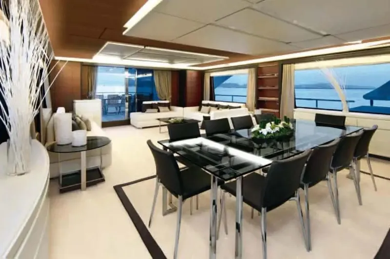  Yacht Photos Pics Luxurious interior of 2011 Benetti Delfino 93 yacht with elegant dining area and sea views.