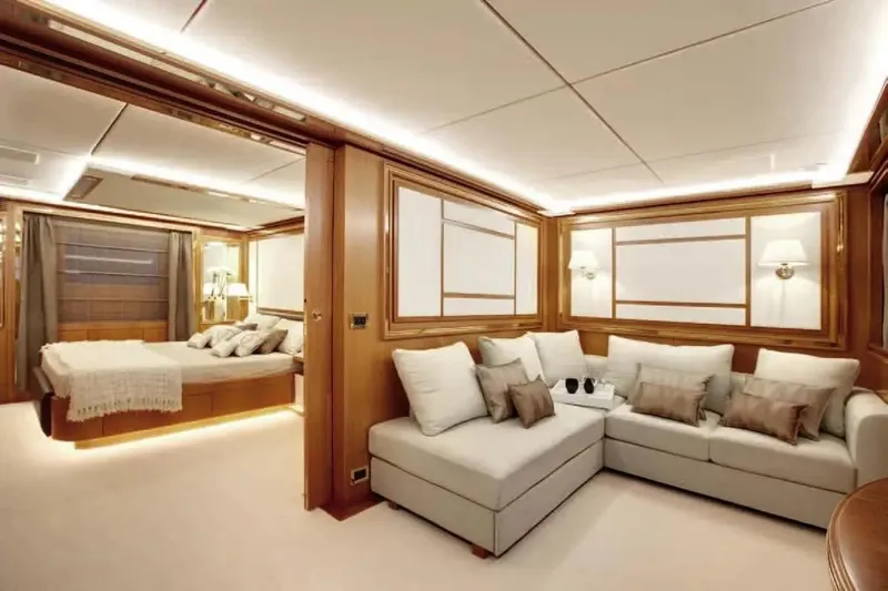  Yacht Photos Pics Luxurious interior of 2011 Benetti Delfino 93 yacht with elegant seating and bedroom.