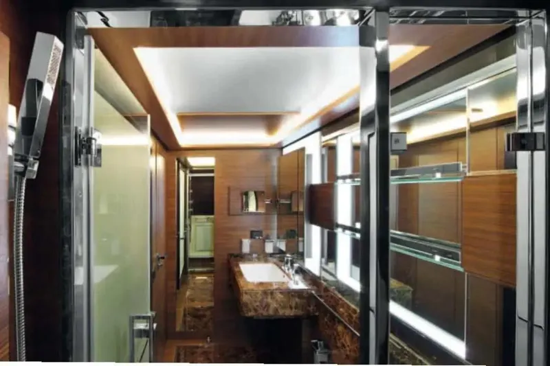  Yacht Photos Pics Luxurious bathroom interior on 2011 Benetti Delfino 93 yacht, featuring modern design and elegant finishes.