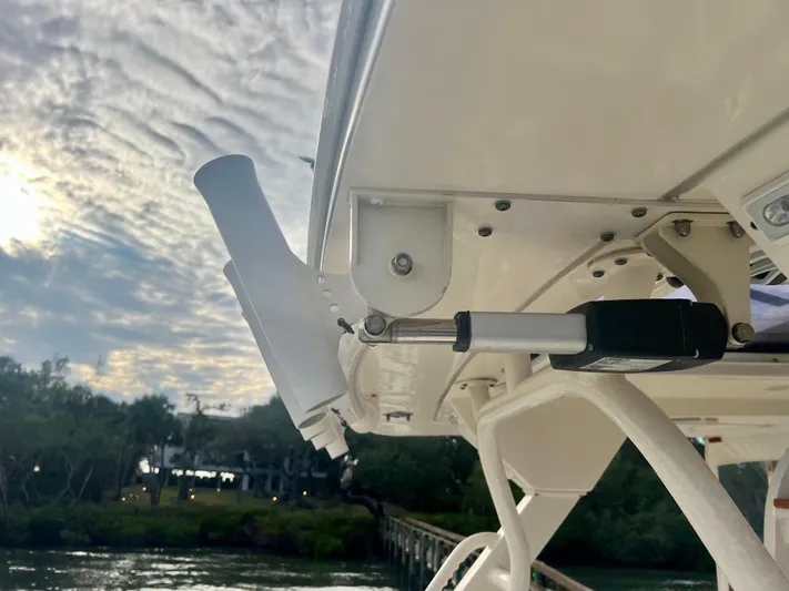  Yacht Photos Pics Close-up of 2020 Scout 420 LXF boat detail against a scenic sky and water backdrop.