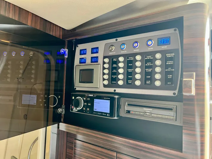  Yacht Photos Pics Control panel of 2020 Scout 420 LXF boat with digital displays and switches.