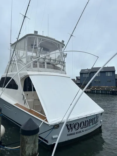  Yacht Photos Pics 2000 Post 47 Convertible yacht docked, named "Woodpile," in Forked River, NJ.