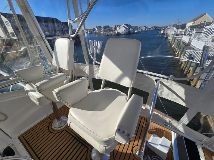  Yacht Photos Pics Luxury seating on 2000 Post 47 Convertible yacht overlooking marina.