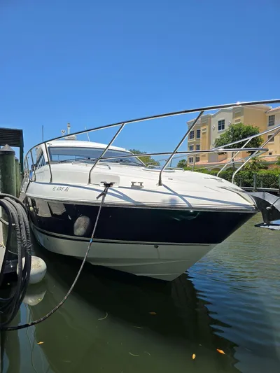  Yacht Photos Pics 2013 Fairline Targa 38 Open yacht docked in sunny marina.