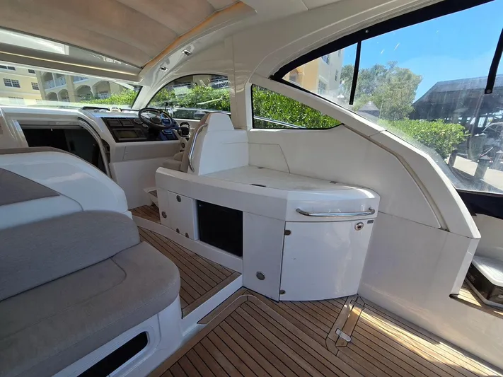  Yacht Photos Pics Interior of 2013 Fairline Targa 38 Open yacht, featuring sleek design and wooden flooring.