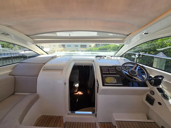  Yacht Photos Pics 2013 Fairline Targa 38 Open yacht interior with helm and seating area.