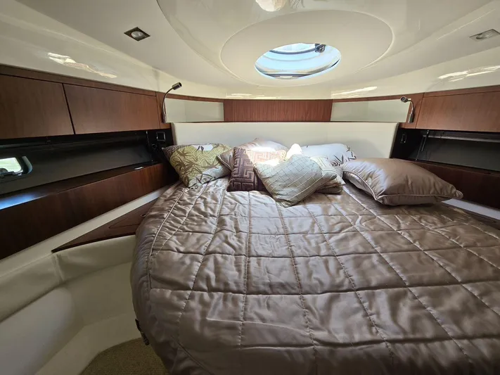  Yacht Photos Pics Luxurious cabin interior of 2013 Fairline Targa 38 Open with plush bedding and modern design.