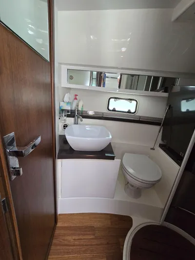  Yacht Photos Pics 2013 Fairline Targa 38 Open yacht bathroom with modern sink and toilet.
