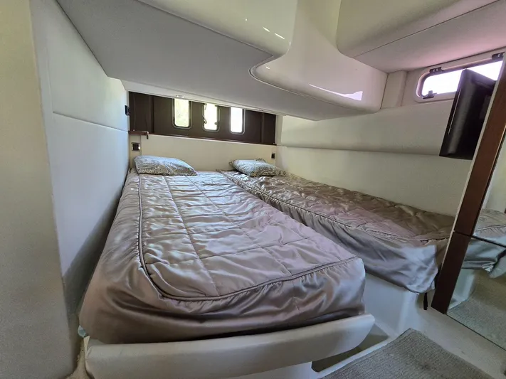  Yacht Photos Pics 2013 Fairline Targa 38 Open cabin with twin beds, modern interior design.