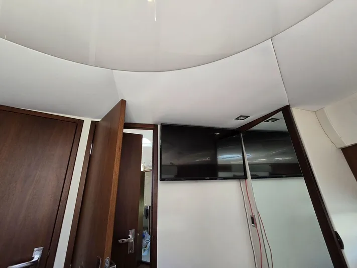  Yacht Photos Pics Interior of 2013 Fairline Targa 38 Open yacht with modern design and TV setup.