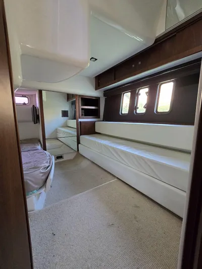  Yacht Photos Pics 2013 Fairline Targa 38 Open interior with white seating and wood accents.