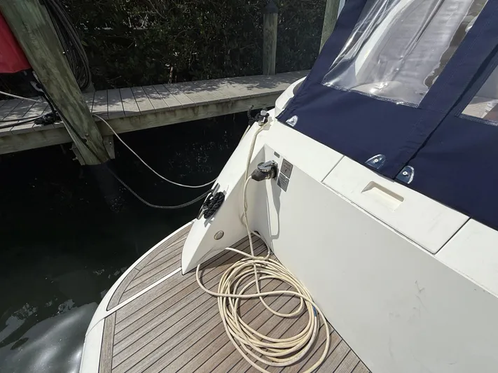  Yacht Photos Pics 2013 Fairline Targa 38 Open yacht docked, showing deck and mooring line.