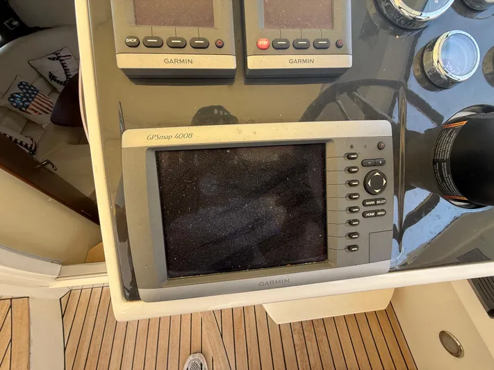  Yacht Photos Pics Garmin GPS and controls on 2013 Fairline Targa 38 Open yacht dashboard.