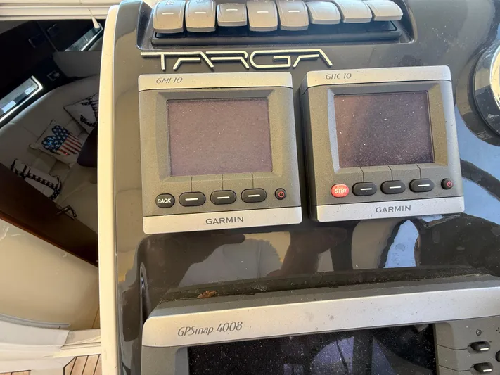  Yacht Photos Pics Control panel of a 2013 Fairline Targa 38 Open with Garmin navigation displays.