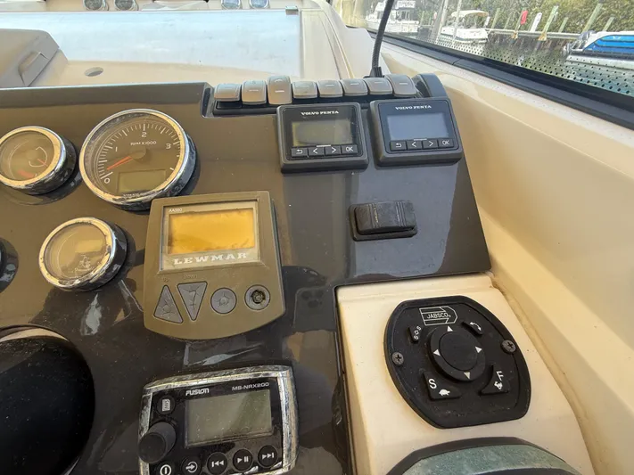  Yacht Photos Pics Control panel of a 2013 Fairline Targa 38 Open yacht with gauges and switches.