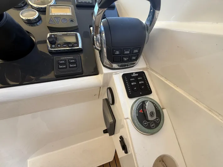  Yacht Photos Pics Control panel of a 2013 Fairline Targa 38 Open yacht, featuring navigation and throttle controls.