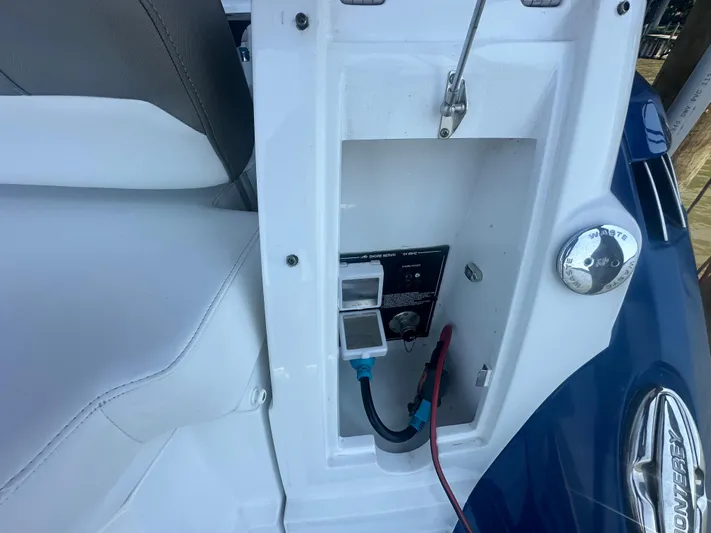 Always Flo&rsquo;n Yacht Photos Pics 2019 Monterey 295 Sport Yacht utility compartment with waste cap and shore power connections.